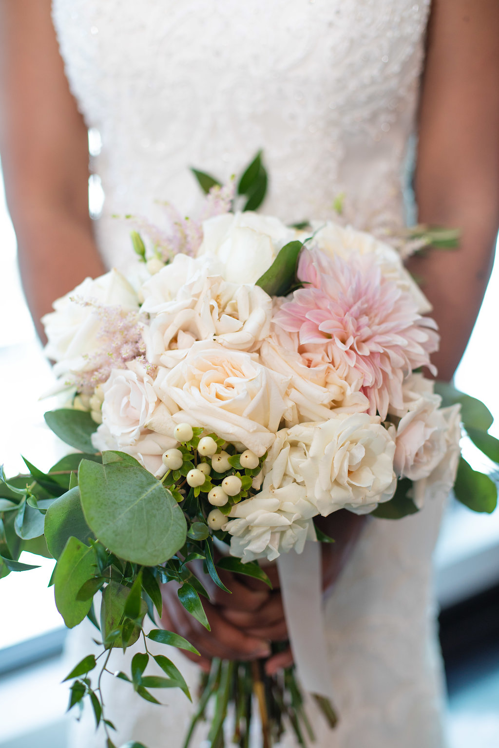 beautiful cream and pastel wedding bouquet
